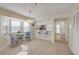 Dining area with cozy bay window and barstool seating at 407 Bouchelle Dr # 205, New Smyrna Beach, FL 32169