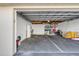 A closed two-car garage door with a tile roof above at 407 Bouchelle Dr # 205, New Smyrna Beach, FL 32169