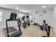 Well-equipped gym featuring modern cardio machines and ample workout space at 407 Bouchelle Dr # 205, New Smyrna Beach, FL 32169