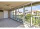 A screened patio offers an outdoor living space overlooking the community at 407 Bouchelle Dr # 205, New Smyrna Beach, FL 32169
