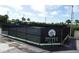 Bouchelle Island Sportsplex featuring a well-maintained tennis court, offering residents a recreational and active lifestyle at 407 Bouchelle Dr # 205, New Smyrna Beach, FL 32169