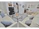 Cozy living room featuring comfortable seating and view of the adjacent dining area at 4225 S Atlantic Ave # 2070, New Smyrna Beach, FL 32169