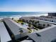 Aerial view of Colony Beach Club with a pool and beach in the background at 4225 S Atlantic Ave # 2150, New Smyrna Beach, FL 32169