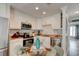 Modern kitchen features stainless steel appliances, granite countertops, and bright white cabinetry at 4225 S Atlantic Ave # 2150, New Smyrna Beach, FL 32169