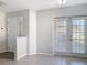 Clean entryway featuring tile floors, neutral paint, and view to outside at 4583 Barnacle Dr, Port Orange, FL 32127