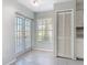 Inviting living space with tile flooring, neutral paint, and natural light from the window at 4583 Barnacle Dr, Port Orange, FL 32127