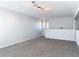 This loft has carpeting, neutral walls, and two windows at 4583 Barnacle Dr, Port Orange, FL 32127
