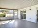 Relaxing patio with tile flooring and screen panels at 4583 Barnacle Dr, Port Orange, FL 32127