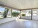 Relaxing screened patio with tile flooring and outdoor view at 4583 Barnacle Dr, Port Orange, FL 32127