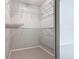 Spacious walk-in closet with white wire shelving provides ample storage space at 4583 Barnacle Dr, Port Orange, FL 32127