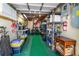Well-organized garage with storage, tools, and equipment at 519 Mobile Ave, Daytona Beach, FL 32118