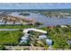 Beautiful aerial view of the condo and waterfront community, with boats and lush landscape at 520 S Peninsula Ave # 2C7, New Smyrna Beach, FL 32169