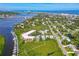 Expansive aerial view featuring the condo, boat docks, and neighborhood near the waterway at 520 S Peninsula Ave # 2C7, New Smyrna Beach, FL 32169