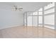 Spacious living room with fan and lots of light at 520 S Peninsula Ave # 2C7, New Smyrna Beach, FL 32169