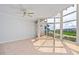 Bright living room featuring lots of natural light and stunning water views at 520 S Peninsula Ave # 2C7, New Smyrna Beach, FL 32169
