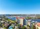 Stunning aerial view of the condo complex, showcasing the waterfront location, pool, and beautiful surroundings at 533 Marina Point Dr # 533, Daytona Beach, FL 32114