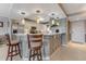 Kitchen with granite countertops, stainless appliances, and a breakfast bar with seating at 533 Marina Point Dr # 533, Daytona Beach, FL 32114