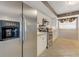 Well-lit kitchen featuring modern appliances, decorative backsplash, tile flooring, and ample cabinet space at 533 Marina Point Dr # 533, Daytona Beach, FL 32114