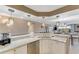 Bright kitchen with granite countertops, stainless steel appliances, and pendant lighting at 533 Marina Point Dr # 533, Daytona Beach, FL 32114