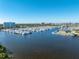 Expansive marina view showcases numerous boats docked, providing a glimpse of vibrant maritime activity at 533 Marina Point Dr # 533, Daytona Beach, FL 32114