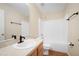 This bathroom features a sink, vanity, mirror, toilet, and shower-tub combo at 549 Coral Trace Blvd, Edgewater, FL 32132