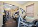 A bright gym with a variety of equipment including weights, treadmills, and ellipticals at 549 Coral Trace Blvd, Edgewater, FL 32132
