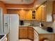 Well-equipped kitchen with ample cabinet space, stainless steel sink, and modern appliances at 630 Yupon Ave, New Smyrna Beach, FL 32169