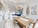 Open floor plan with dining area and living room, perfect for entertaining guests at 6665 Merryvale Ln, Port Orange, FL 32128