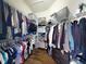 Spacious walk-in closet provides ample storage with custom shelving and organized racks for clothing and accessories at 6665 Merryvale Ln, Port Orange, FL 32128