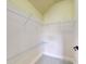 Walk-in closet with wire shelving and neutral carpet at 6665 Merryvale Ln, Port Orange, FL 32128