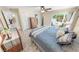 Bright bedroom featuring light hardwood floors and sliding glass doors to outdoor patio at 72 Oceanview Ave, Ponce Inlet, FL 32127