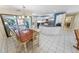 Open floor plan from dining room to modern kitchen at 72 Oceanview Ave, Ponce Inlet, FL 32127