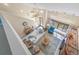Open-concept living room with high ceilings, clerestory windows, and comfortable seating at 72 Oceanview Ave, Ponce Inlet, FL 32127