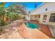 Backyard pool area showcasing a small pool, patio, and landscaping at 72 Oceanview Ave, Ponce Inlet, FL 32127