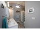 Elegant bathroom with double vanity, modern fixtures, and soothing neutral color palette at 731 Pine Shores Cir, New Smyrna Beach, FL 32168