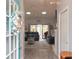 Spacious living room with lots of natural light, comfortable seating and an open floor plan at 731 Pine Shores Cir, New Smyrna Beach, FL 32168
