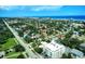 Picturesque coastal city aerial view, featuring ocean, tree-lined streets, buildings, and a distant skyline at 746 N Halifax Ave, Daytona Beach, FL 32118