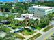 Inviting home with lush landscaping, a red tile roof, and a charming Mediterranean-style facade at 746 N Halifax Ave, Daytona Beach, FL 32118