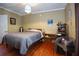 Cozy bedroom featuring hardwood floors and neutral decor at 746 N Halifax Ave, Daytona Beach, FL 32118