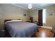 Comfortable bedroom with hardwood floors and ample natural light at 746 N Halifax Ave, Daytona Beach, FL 32118