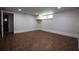 Empty bedroom with tile flooring, natural light, and neutral walls at 746 N Halifax Ave, Daytona Beach, FL 32118