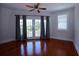 Spacious bedroom with hardwood floors and french doors at 746 N Halifax Ave, Daytona Beach, FL 32118