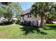Charming home featuring a well-manicured lawn and mature landscaping at 746 N Halifax Ave, Daytona Beach, FL 32118