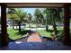 Inviting view of the home's front yard with lush landscaping and a charming walkway at 746 N Halifax Ave, Daytona Beach, FL 32118