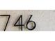 Close-up of the house number '746' on the exterior of the home at 746 N Halifax Ave, Daytona Beach, FL 32118