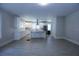 Bright kitchen features white cabinets, stainless steel appliances and large center island with seating at 746 N Halifax Ave, Daytona Beach, FL 32118