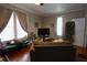 Comfortable living room with hardwood floors and lots of natural light at 746 N Halifax Ave, Daytona Beach, FL 32118