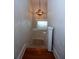 Cozy staircase with decorative hanging light fixture at 746 N Halifax Ave, Daytona Beach, FL 32118