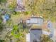 Aerial view of a property showcasing the roof, backyard, and surrounding greenery at 812 Marion St, Daytona Beach, FL 32114