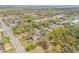An aerial view of the property in a tree lined neighborhood with city views at 812 Marion St, Daytona Beach, FL 32114